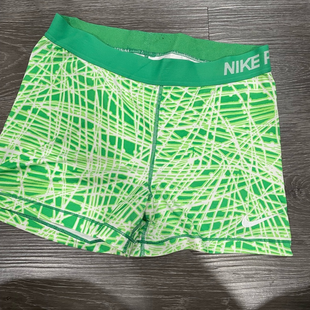 Bright green Nike Pro shorts
